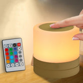 ERUN nursery night light in gold on a bedside table creating a cozy bedtime ambiance
