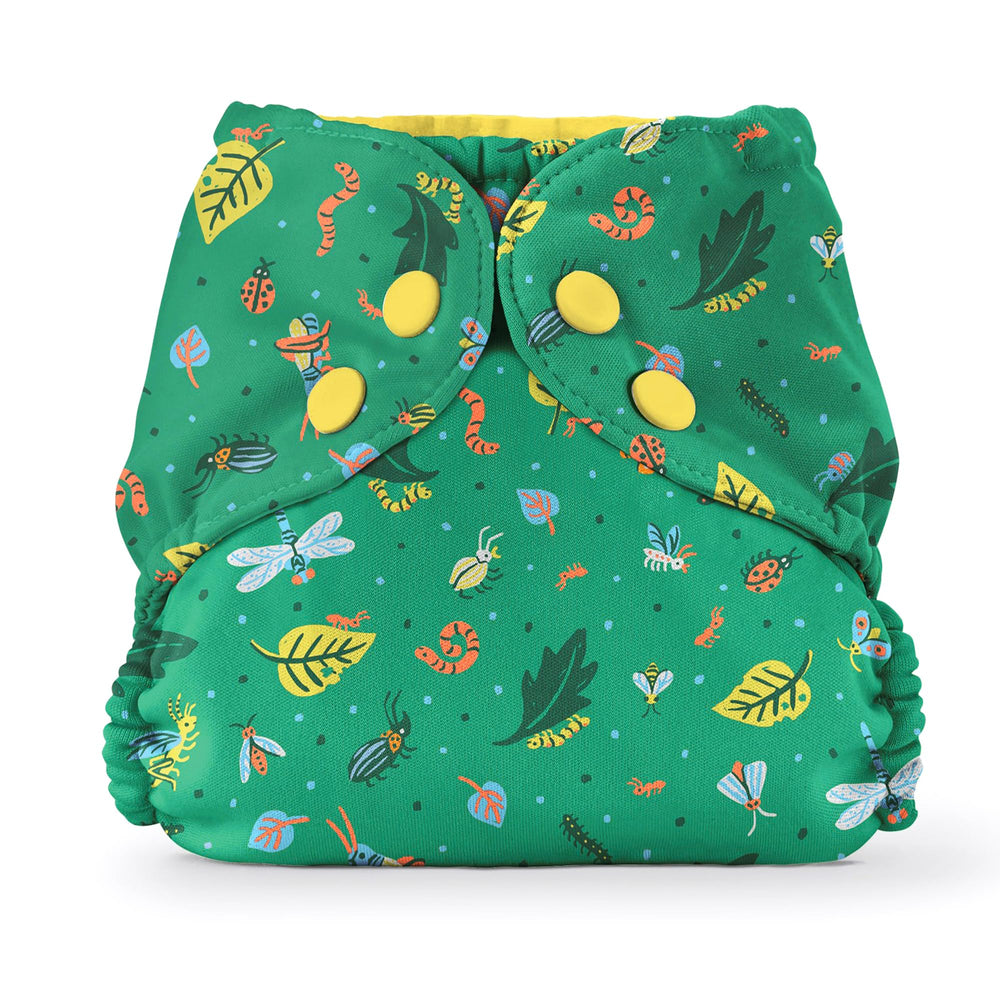 Esembly outer over inner diaper protects against blowouts for easy changes.