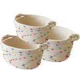 Esme L&H small woven rope basket handle closeup shows sturdy knot handles for easy carrying.