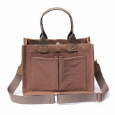 ESVAN tote bag in canvas with front pocket, ideal for quick access essentials.