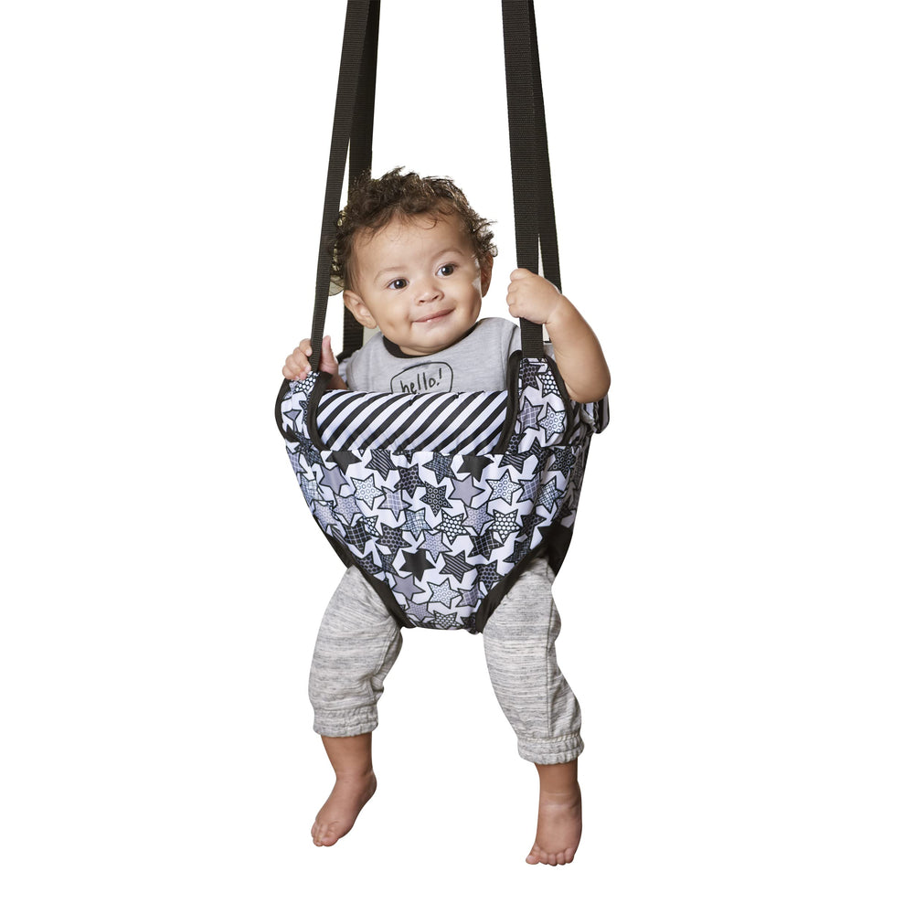 Evenflo Roo Door Jumper clamp demonstrates tool-free setup for quick room transitions.