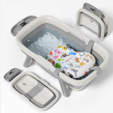 EverKiddo collapsible baby bathtub with thermometer for easy water temp checks.