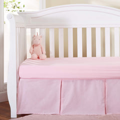 EVERYDAY KIDS crib dust ruffle with split corners conceals under-crib storage neatly.