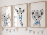 Eviepops Prints safari elephant with blue bow tie adds a playful focal point for a nursery.