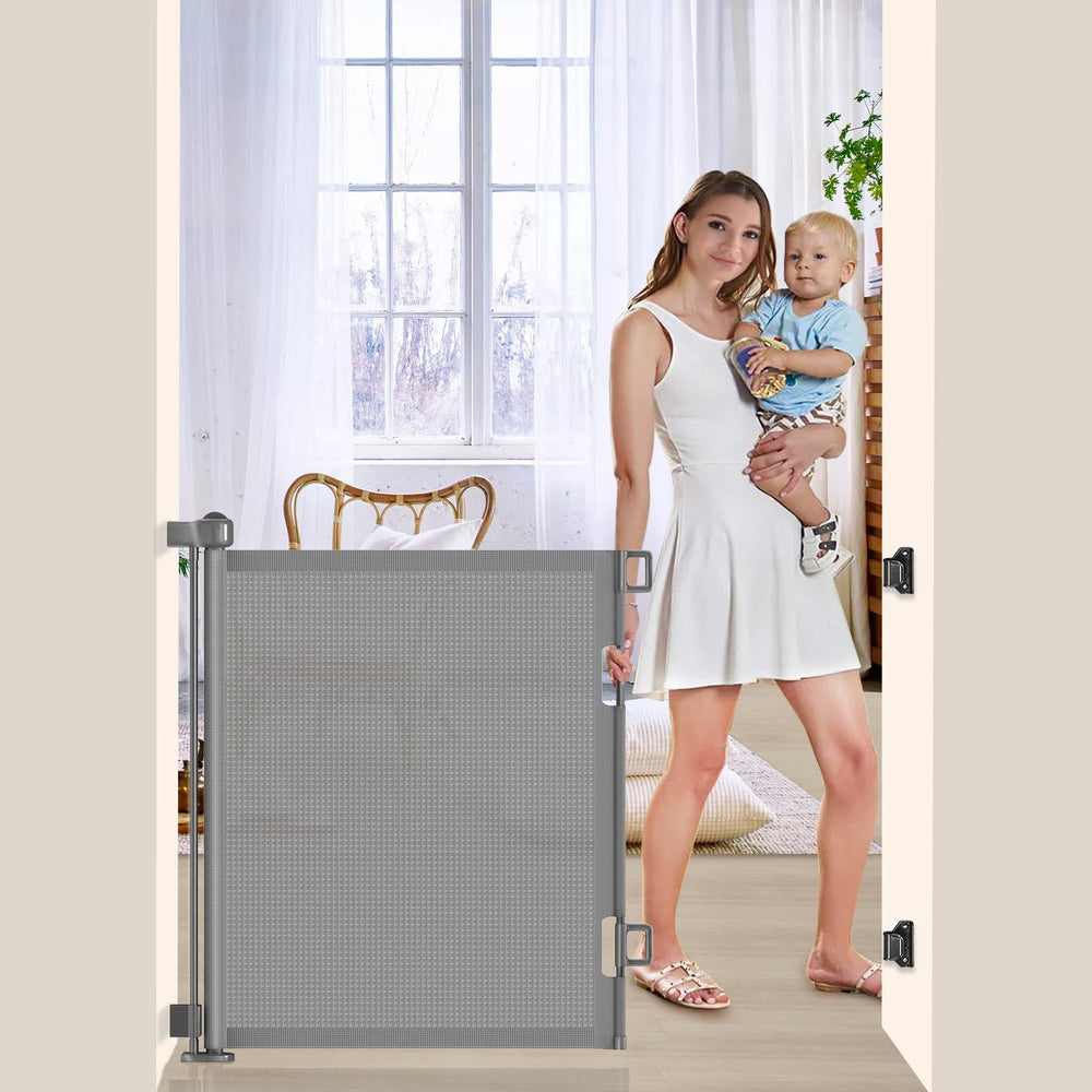 EZIGO 55-inch retractable baby gate in doorway for safe play