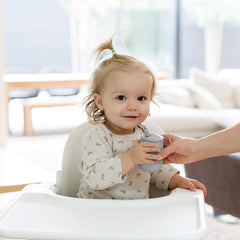 ezpz Mini Cup + Straw pewter lid shows secure, mess-free on-the-go use.