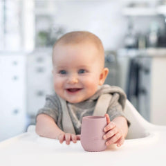 ezpz Tiny Cup Blush non-slip grip helps steady feeding attempts