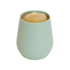 ezpz Tiny Cup Sage interior angle enables even flow for controlled drinking.