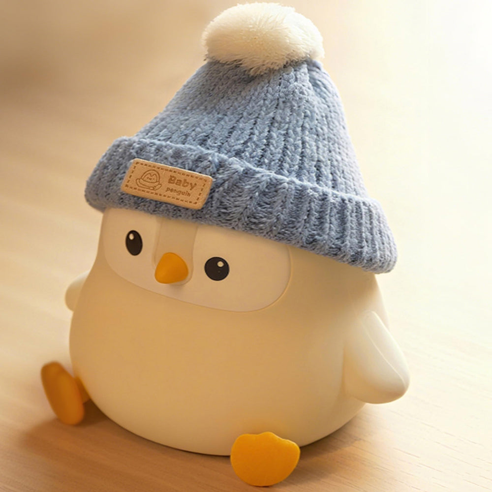 Famiduo Penguin Lamp with Knit Hat, front view, provides a gentle, comforting glow.