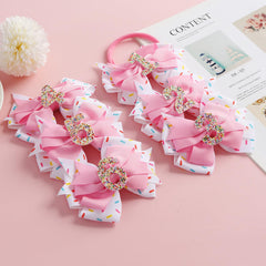 Fancheer handmade bows for baby girls with a pink clip