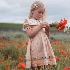 Fancy Clouds light blue daisy clip delivers fresh flair and secure wear.