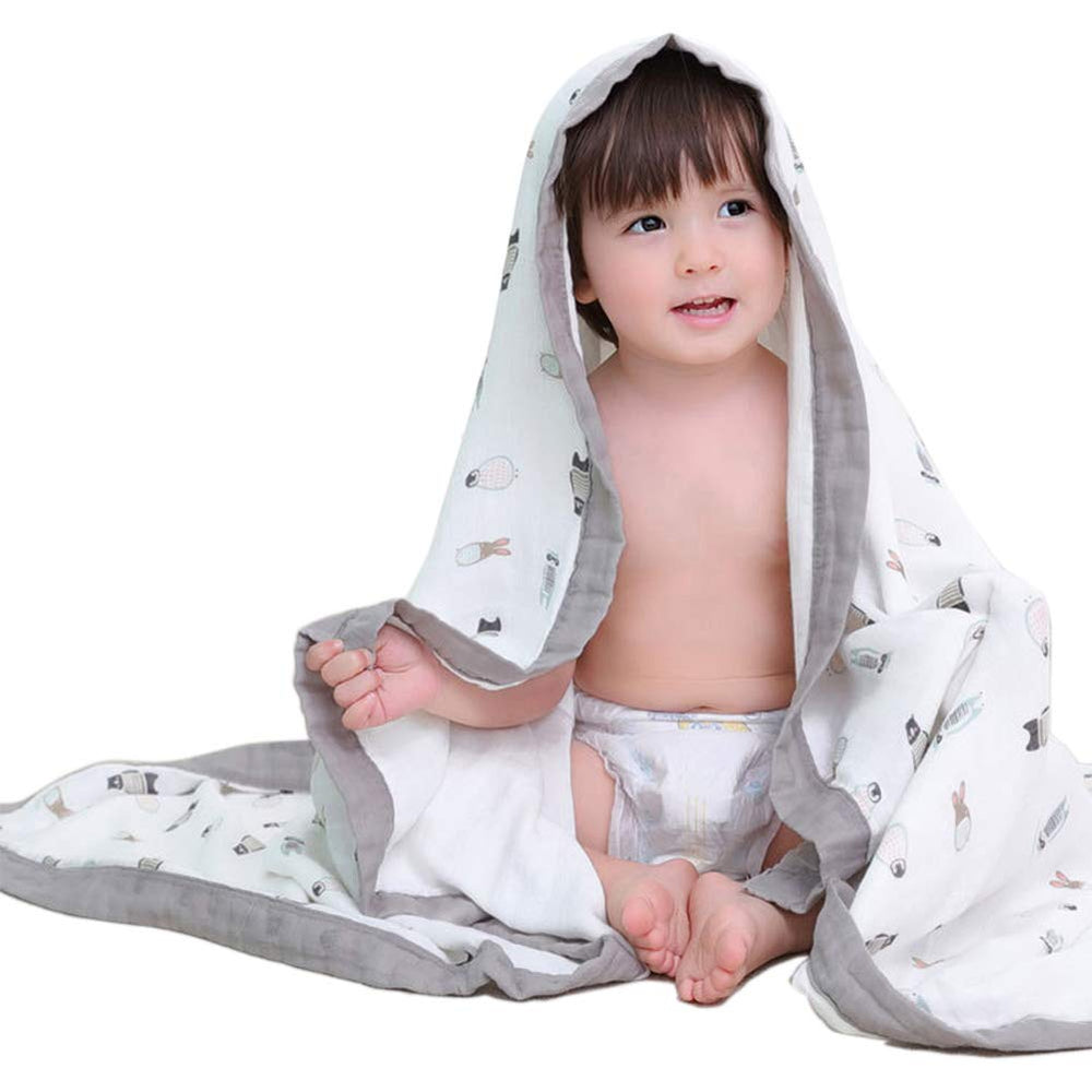 Farmer Mani baby muslin swaddle blanket gray, cozy and breathable for sensitive skin.