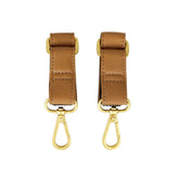 FAWN DESIGN stroller hooks in tan, front view, adds secure, stylish bag organization on outings.