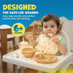 Feed Me Fun bamboo suction bowl firmly grips a tray to minimize mess.