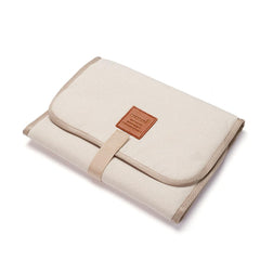 FGDTREE portable foldable changing pad in beige for on-the-go diaper changes