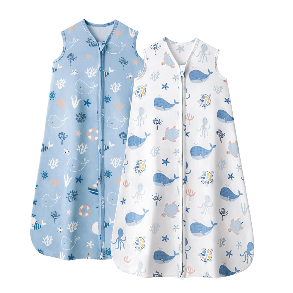 FIEMOL baby sleep sack with blue whale design provides gentle warmth for peaceful naps.