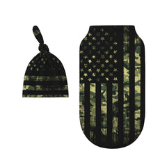 Figtihw camo flag swaddle blanket wrapped around baby for secure sleep