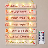 Fiobee seven-panel wall art glows softly, creating cozy teen room ambiance.