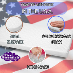 First Essentials bassinet mattress spot-cleaning demonstrates easy maintenance between uses