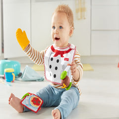 Fisher-Price Cutest Chef crinkle recipe card offers tactile play