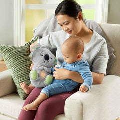 Fisher-Price Koala plush textures invite gentle tactile exploration.
