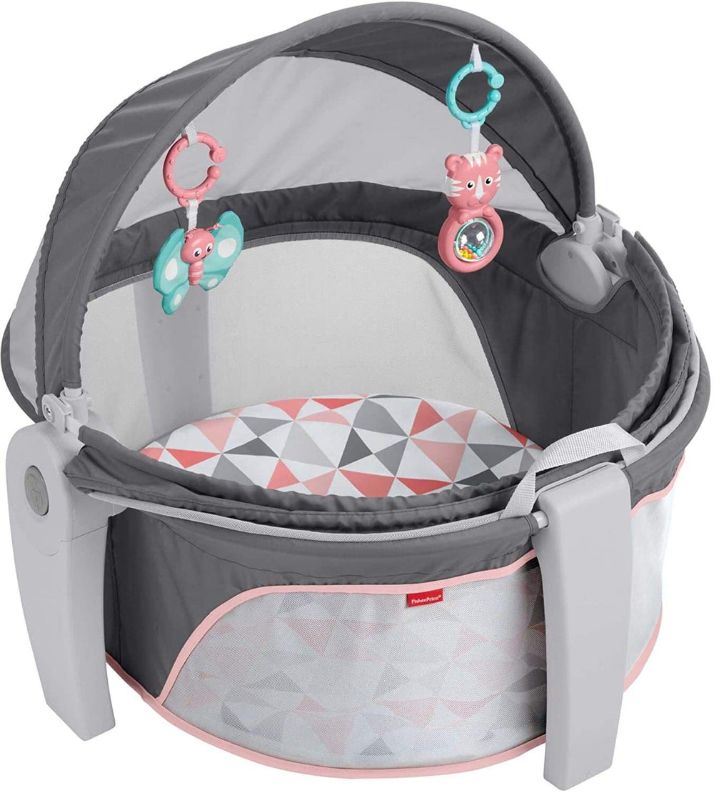 Fisher-Price portable bassinet dome ready for nap or playtime on the go.
