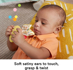 Fisher-Price Snuggle Bunny Teether used during tummy time for sensory exploration