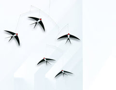 Flensted Denmark handmade mobile with swallows in flight.