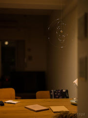 Flensted Mobiles atom model with detailed rings highlighting scientific-inspired decor.