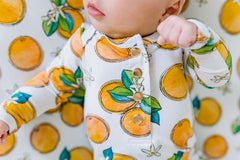 Florida Kid Co. Orange Blossom cover brightens nursery styling with a playful print.