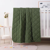 FLXXIE olive toddler comforter folded for easy storage and travel