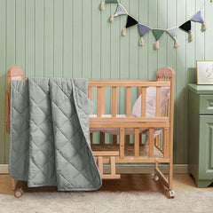 FLXXIE toddler comforter shows lightweight warmth ideal for stroller rides and naps.