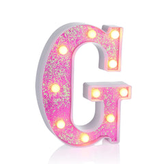 Foaky pink light-up letters on wall illuminate events with playful charm.