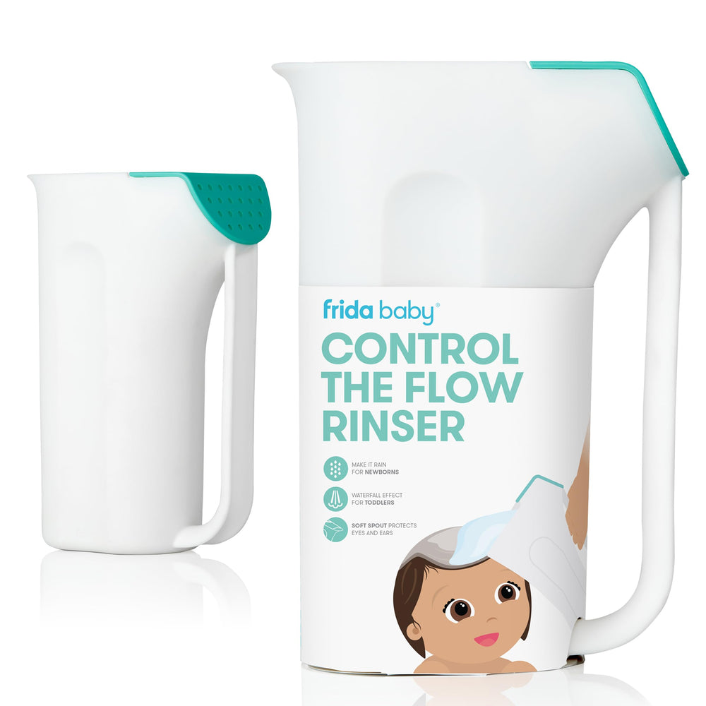 Frida Baby Control The Flow Rinser in use for a gentle full-body bath.