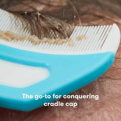 Frida Baby FlakeFixer brush helps loosen flakes for cradle cap care.