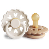 Frigg Andersen Fairytale pacifier in cream, silky satin finish, promotes gentle soothing for infants.