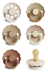 FRIGG Cinnamon Charm pacifier front view shows natural rubber nipple for soothing comfort.