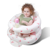 FRTUI inflatable baby seat in pink love rabbit offers safe, comfortable seating for snacks.