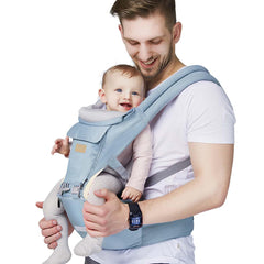 FRUITEAM 6-in-1 hip-seat carrier provides ergonomic support for infants and toddlers during travel.