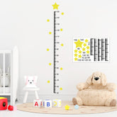 Fssqii star height chart sticker on wall for growth tracking and playful decor.