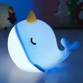 Fuloon Narwhal night light in blue whale shape provides calming bedtime illumination.