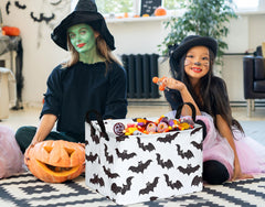 FUULOXE Halloween organizer bin featuring pumpkins and ghosts for festive organizing.