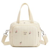 Fwkekye small diaper bag tote main view shows organized space for essentials.