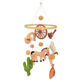 Gaiaring cowboy mobile over crib adds rustic charm and visual stimulation.