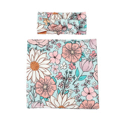 Galabloomer swaddle in lightweight fabric for warm months and airy comfort