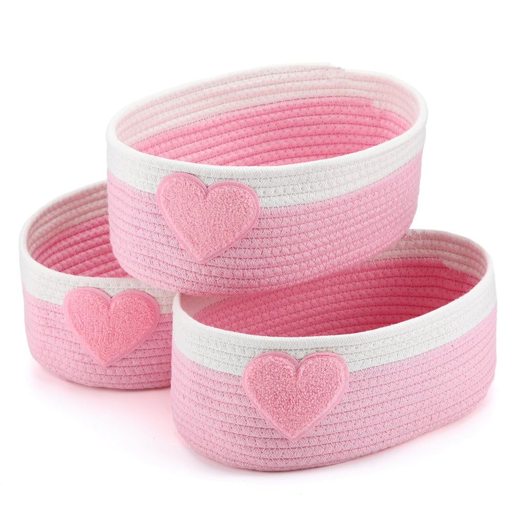 Geelin pink heart baskets collection arranged together for stylish home organization.