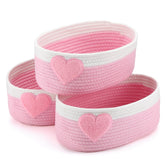 Geelin pink heart baskets collection arranged together for stylish home organization.
