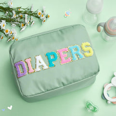 Geetery chenille letter patch diaper bag with glitter adds elegant storage for diaper changes.