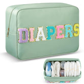Geetery portable diaper caddy in sage green keeps baby essentials organized on the go.