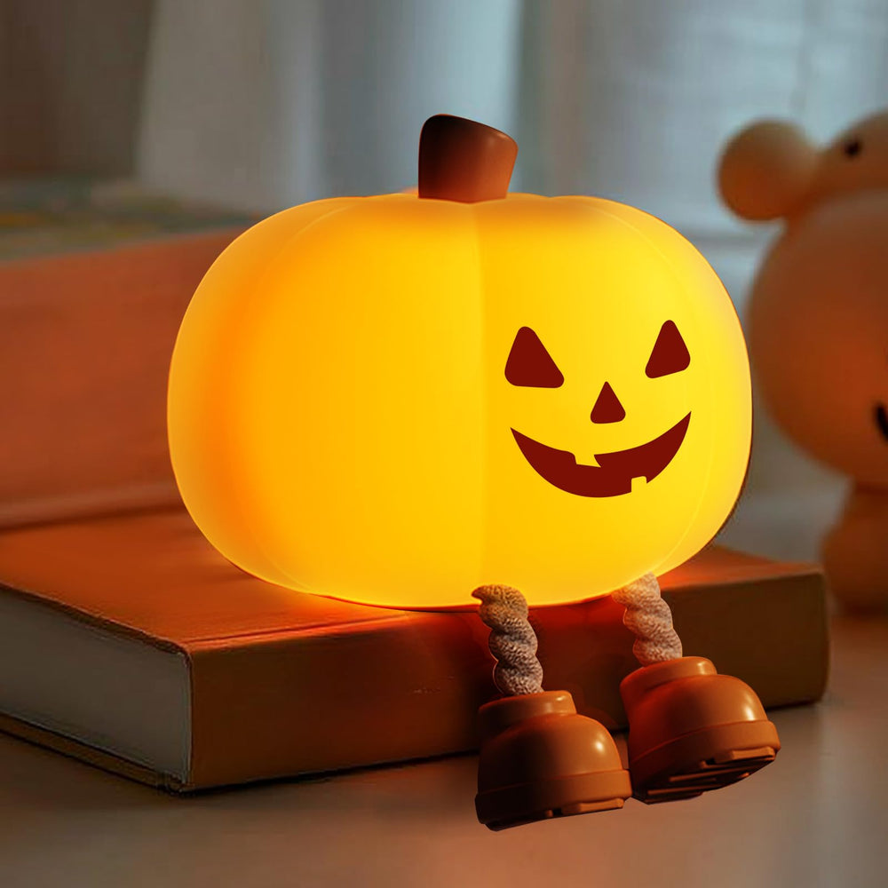 Gefaxi Pumpkin Night Light squishy face glows softly, kid-friendly bedtime companion.